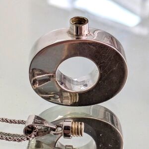 Genuine sterling perfume pendant